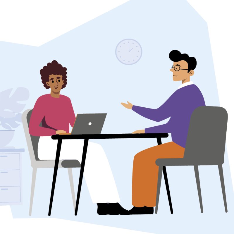 Graphique 4 v Réinsertion professionnelle avec l’AI – témoignage d’une personne autiste Deux personnes sont assises face à face à une table. L’une prend des notes sur son ordinateur portable et sourit, l’autre parle et a l’air sérieuse. À l’arrière-plan, on aperçoit une horloge murale et une petite étagère avec une plante.